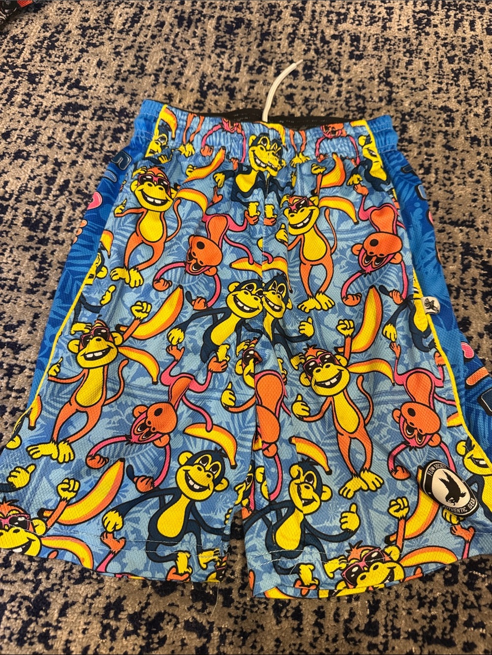 Boys Blue Monkey Print Swim Shorts with Yellow & Orange Accents
